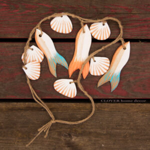 Дерев'яні рибки і мушлі
